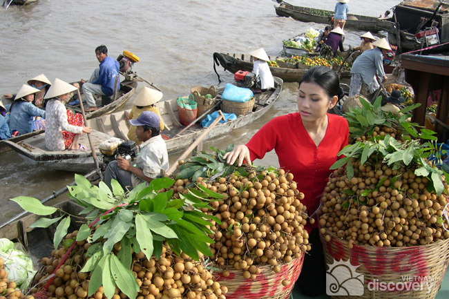 A wide range of fruits on sales on the floating market - Hanoi unique experience