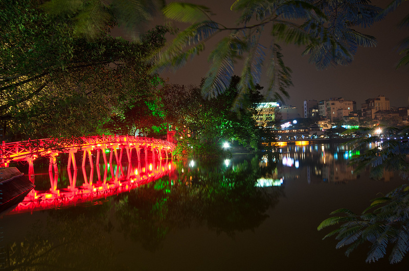The Huc Bridge sparkling under lights - Hanoi city discovery trips